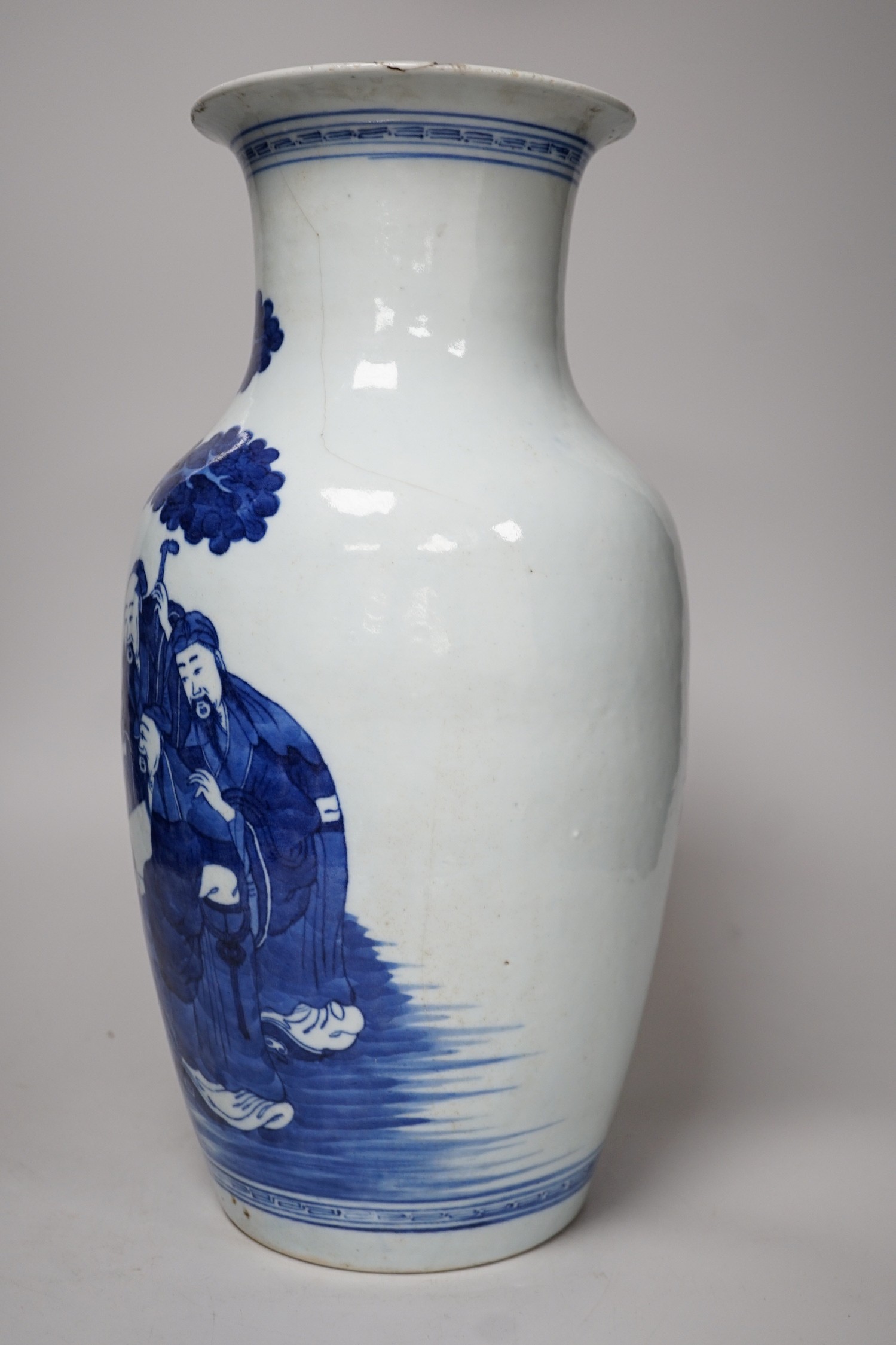A large Chinese blue and white export vase, decorated with sages and attendants reviewing a scroll (a.f.), 37cms high